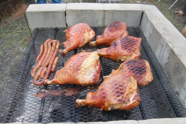 The meat is smoked for 8 - 10 hours in the pit.